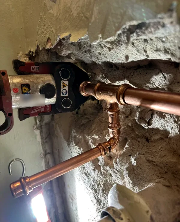 Copper press fitting repair inside an opened wall